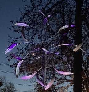 A Crescent Moon Behind Jan's Wind Sculpture